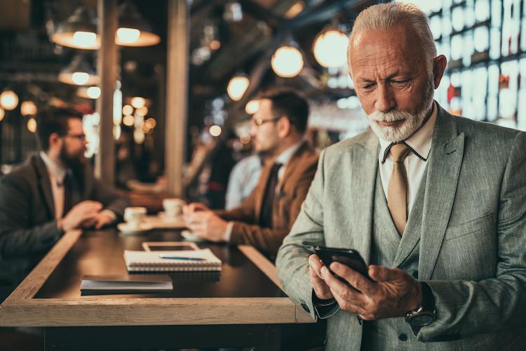 Older gentleman using mobile phone